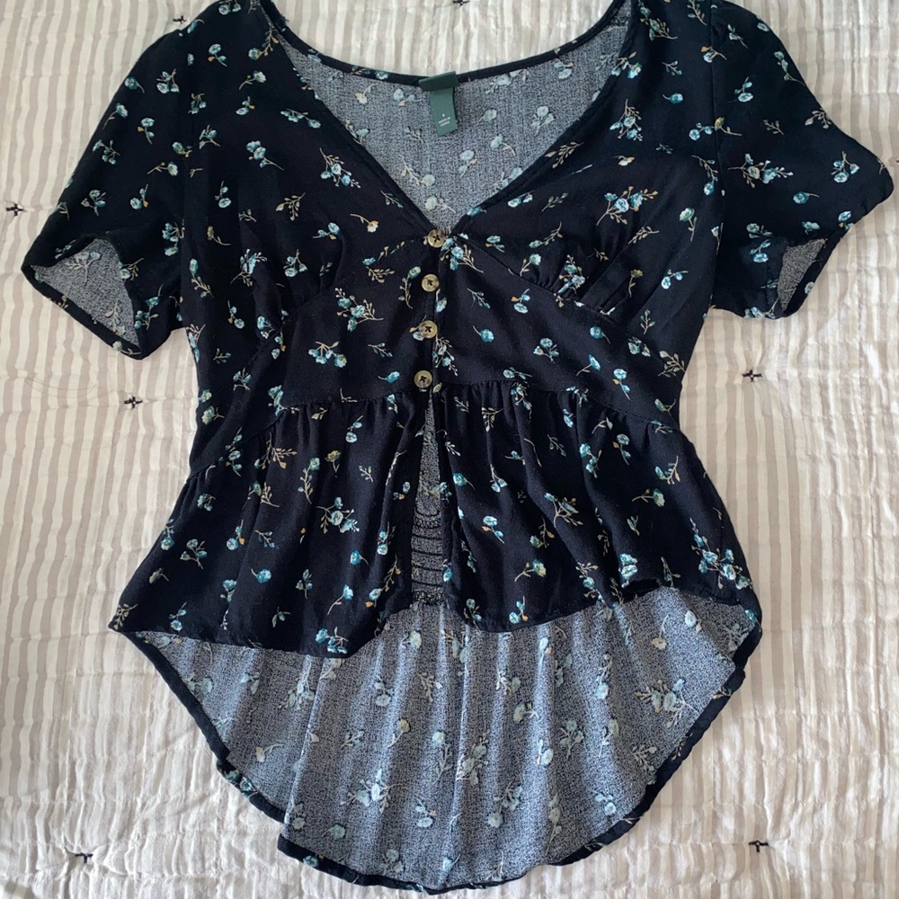 Black blouse with blue flowers